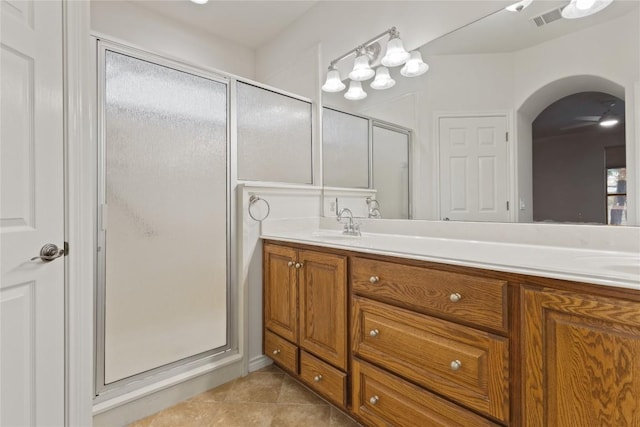 4921 Big Bend Trl, Georgetown, TX 78633 - bathroom featuring a shower stall, vanity, tile patterned flooring, and a ceiling fan