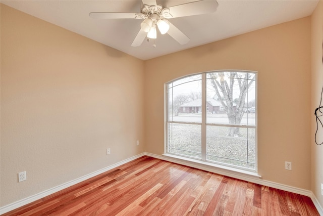 233 Thomas Dr, Martindale, TX 78655 - unfurnished room featuring plenty of natural light, light wood-type flooring, and a ceiling fan