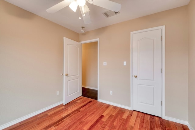 233 Thomas Dr, Martindale, TX 78655 - unfurnished bedroom with light wood-type flooring and a ceiling fan