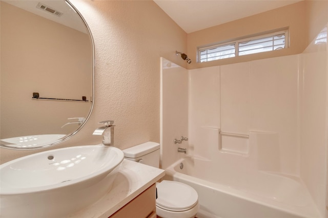 233 Thomas Dr, Martindale, TX 78655 - bathroom with tub / shower combination, a textured wall, and vanity