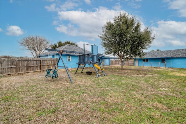 233 Thomas Dr, Martindale, TX 78655 - fenced yard with a playground