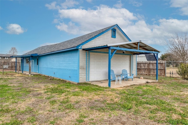 233 Thomas Dr, Martindale, TX 78655 - back of property featuring an attached garage