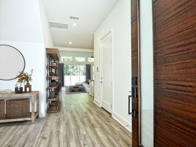 402 Zennia St, Austin, TX 78751 - hall featuring light wood-style flooring and recessed lighting