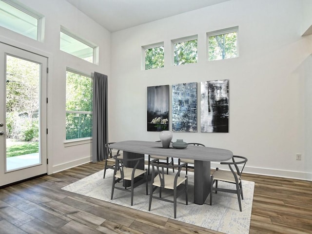 402 Zennia St, Austin, TX 78751 - dining space featuring healthy amount of natural light, wood finished floors, and a high ceiling