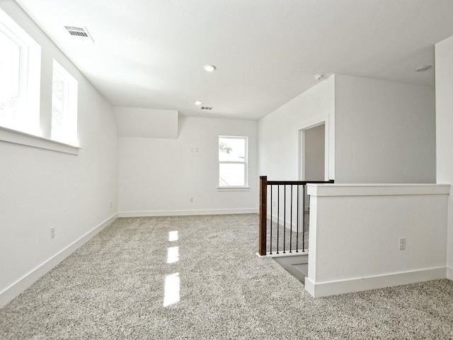 402 Zennia St, Austin, TX 78751 - unfurnished room featuring carpet, recessed lighting, and a smoke detector