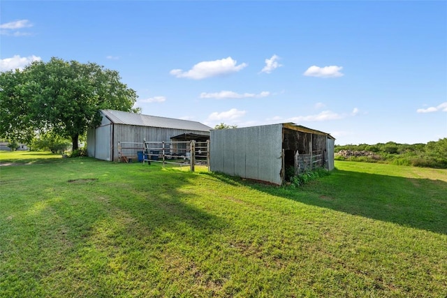 108 Whispering Pines Dr, Bastrop, TX 78602 - view of green lawn featuring an outbuilding and an outdoor structure