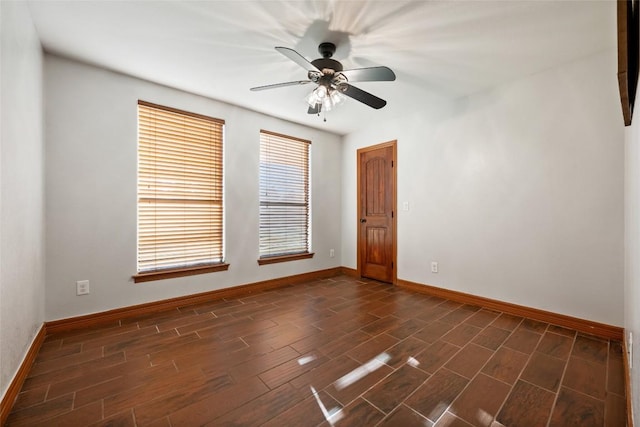 108 Whispering Pines Dr, Bastrop, TX 78602 - unfurnished room with dark wood-type flooring and ceiling fan