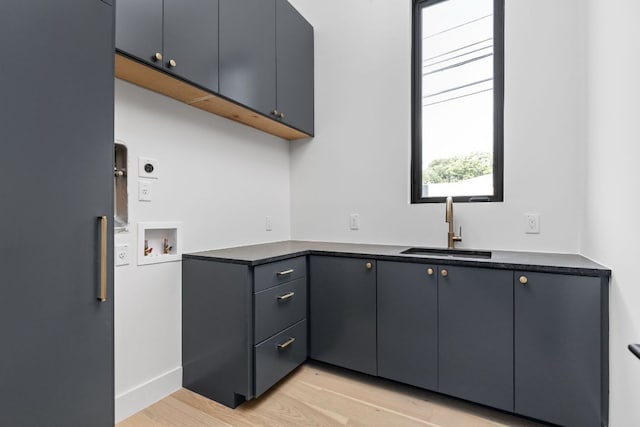 2701 Greenlee Dr, Austin, TX 78703 - kitchen featuring light wood-type flooring and dark countertops