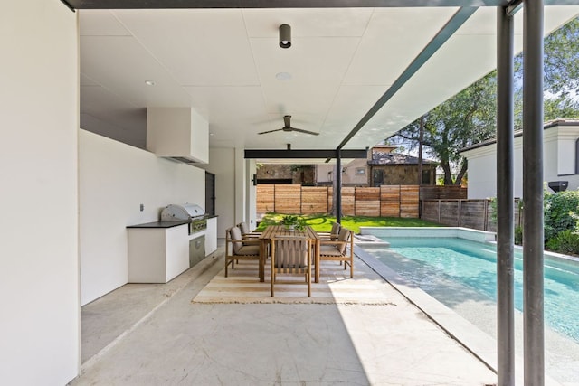 2701 Greenlee Dr, Austin, TX 78703 - fenced backyard featuring area for grilling, ceiling fan, and a patio area