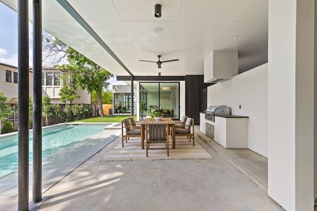 2701 Greenlee Dr, Austin, TX 78703 - view of patio featuring an outdoor kitchen, a ceiling fan, and outdoor dining area