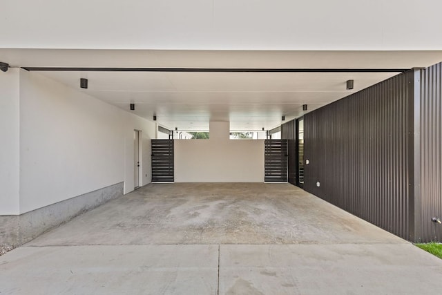 2701 Greenlee Dr, Austin, TX 78703 - garage featuring an attached carport and a gate