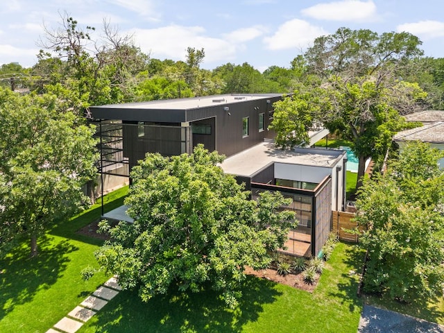 2701 Greenlee Dr, Austin, TX 78703 - rear view of house with a lawn