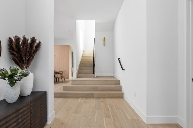 2701 Greenlee Dr, Austin, TX 78703 - staircase with wood finished floors and baseboards