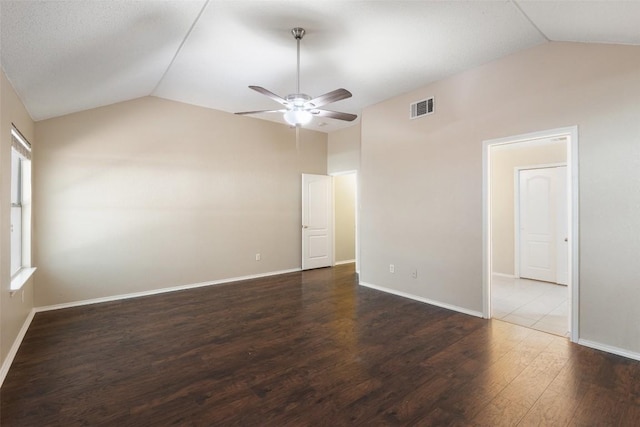 1008 NE Chippewa St, Round Rock, TX 78665 - spare room with vaulted ceiling, ceiling fan, and wood finished floors