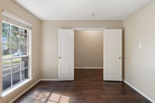 1008 NE Chippewa St, Round Rock, TX 78665 - empty room with a smoke detector and wood finished floors