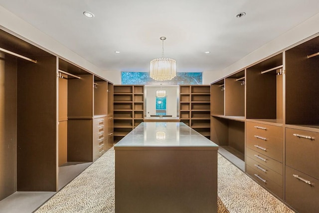 2505 Stratford Dr, Austin, TX 78746 - walk in closet with a chandelier