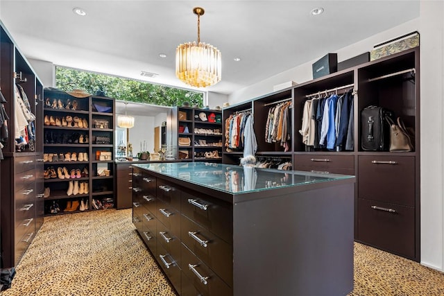 2505 Stratford Dr, Austin, TX 78746 - walk in closet featuring a chandelier