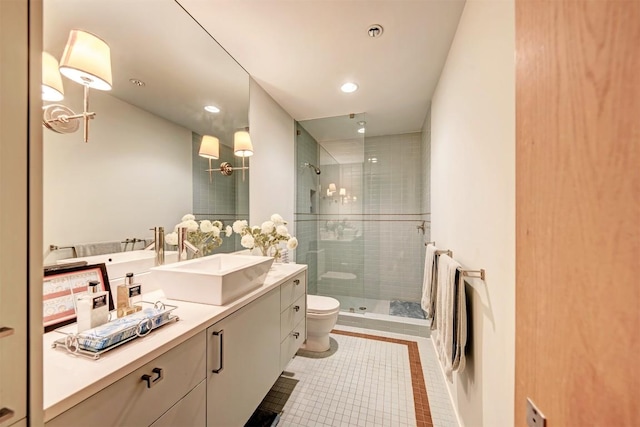 2505 Stratford Dr, Austin, TX 78746 - full bathroom with vanity, a stall shower, tile patterned floors, and recessed lighting