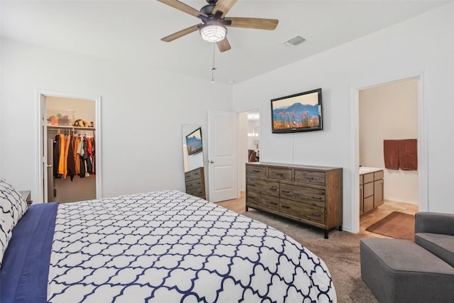 657 Bailey Park Dr, Jarrell, TX 76537 - bedroom featuring carpet floors, a spacious closet, a closet, and ceiling fan