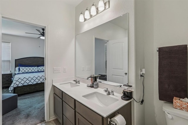 657 Bailey Park Dr, Jarrell, TX 76537 - ensuite bathroom with ceiling fan and double vanity
