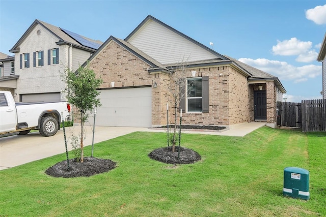 657 Bailey Park Dr, Jarrell, TX 76537 - view of front of property with brick siding, concrete driveway, and an attached garage