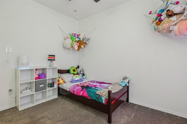 657 Bailey Park Dr, Jarrell, TX 76537 - carpeted bedroom featuring baseboards and ceiling fan