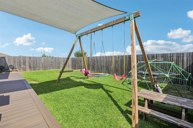 657 Bailey Park Dr, Jarrell, TX 76537 - fenced backyard with a wooden deck