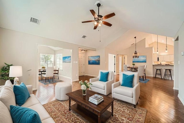 30 Wildwood Dr Unit 92, Georgetown, TX 78633 - living room featuring wood finished floors, ceiling fan, and high vaulted ceiling