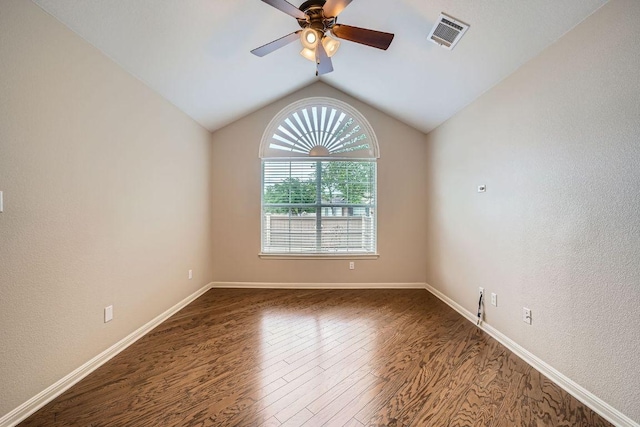 30 Wildwood Dr Unit 92, Georgetown, TX 78633 - spare room with dark wood-style flooring, ceiling fan, and lofted ceiling