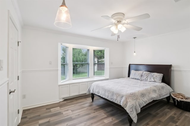 11611 Quarter Horse Trl, Austin, TX 78750 - bedroom with wood finished floors, crown molding, and ceiling fan