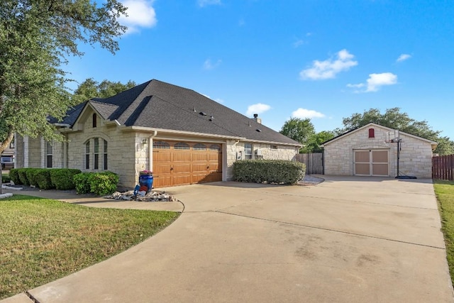 313 Polo Pony, Liberty Hill, TX 78642 - french provincial home with stone siding, driveway, a garage, and roof with shingles