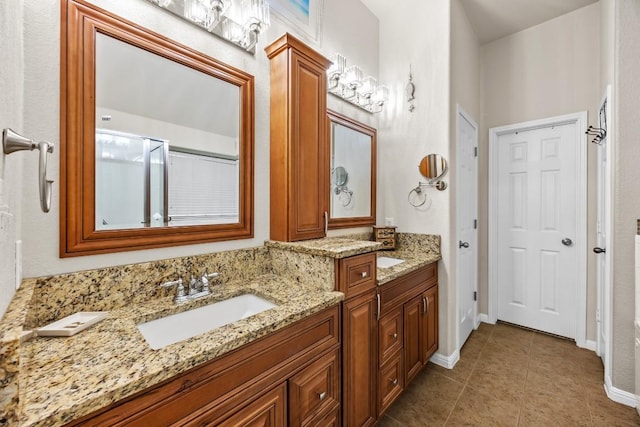 313 Polo Pony, Liberty Hill, TX 78642 - bathroom featuring vanity, tile patterned flooring, and a shower with door