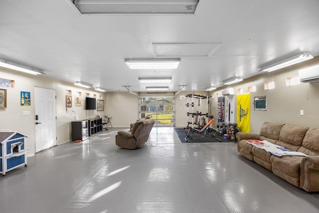 313 Polo Pony, Liberty Hill, TX 78642 - garage with an AC wall unit and a wall unit AC