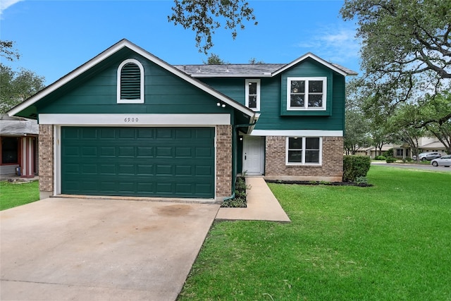 6900 Tesoro Trl, Austin, TX 78729 - view of front of house featuring concrete driveway, brick siding, an attached garage, and a front yard