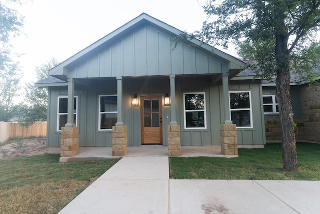 118 Kipapa Ct, Bastrop, TX 78602 - view of front of house with board and batten siding and a porch
