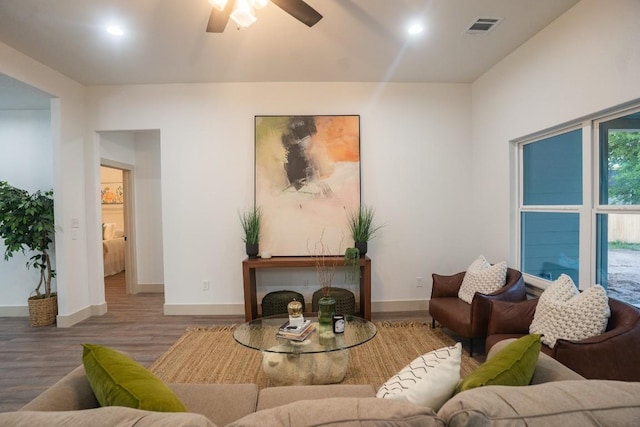 118 Kipapa Ct, Bastrop, TX 78602 - living area with wood finished floors, ceiling fan, and recessed lighting