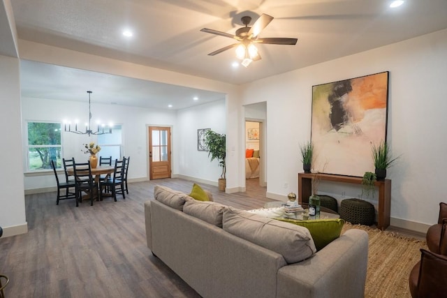 118 Kipapa Ct, Bastrop, TX 78602 - living room with wood finished floors, a chandelier, recessed lighting, and a ceiling fan