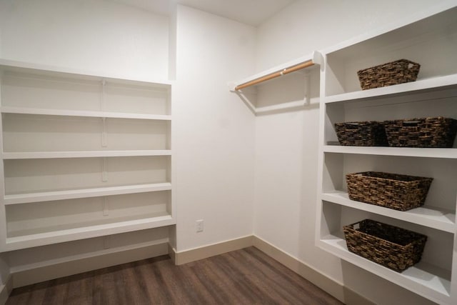 118 Kipapa Ct, Bastrop, TX 78602 - spacious closet featuring dark wood-type flooring