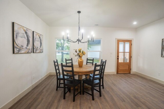 118 Kipapa Ct, Bastrop, TX 78602 - dining space featuring a chandelier, dark wood-style floors, and plenty of natural light