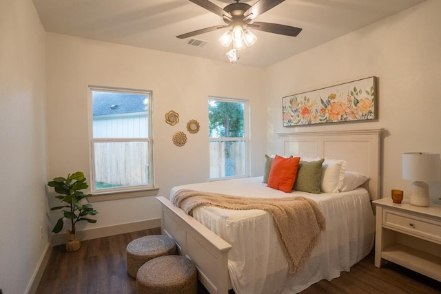 118 Kipapa Ct, Bastrop, TX 78602 - bedroom featuring dark wood-type flooring and ceiling fan
