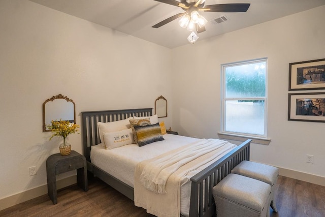 118 Kipapa Ct, Bastrop, TX 78602 - bedroom featuring dark wood finished floors and a ceiling fan