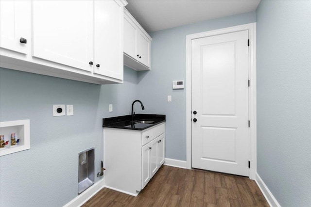 4113 Turning Leaf Dr, Nolanville, TX 76559 - washroom with cabinet space, dark wood finished floors, hookup for an electric dryer, and hookup for a washing machine