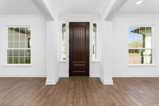 4113 Turning Leaf Dr, Nolanville, TX 76559 - entrance foyer with dark wood-type flooring and crown molding
