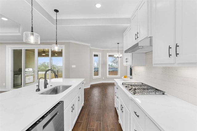 7026 Troyan, Temple, TX 76502 - kitchen with appliances with stainless steel finishes, under cabinet range hood, plenty of natural light, light countertops, and recessed lighting