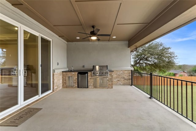 7026 Troyan, Temple, TX 76502 - view of patio / terrace featuring an outdoor kitchen and ceiling fan