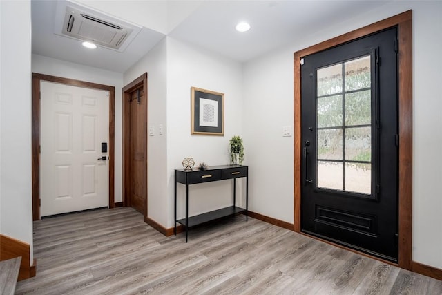 4604 Fawnwood Cv, Austin, TX 78735 - entryway with light wood-type flooring and recessed lighting