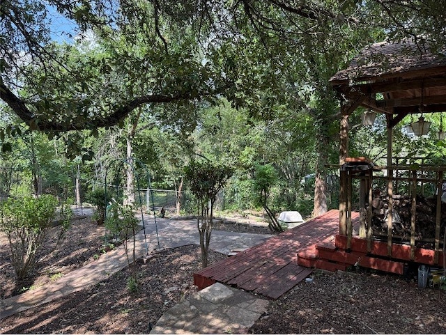 8306 Hanbridge Ln, Austin, TX 78736 - view of yard with a wooden deck