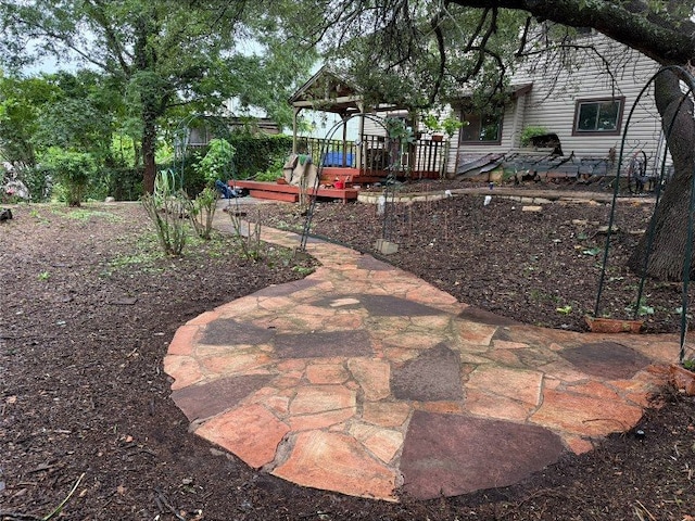 8306 Hanbridge Ln, Austin, TX 78736 - view of yard with a deck
