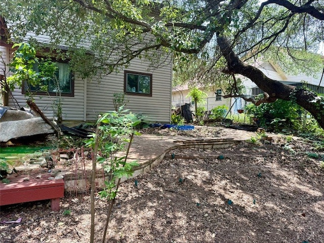 8306 Hanbridge Ln, Austin, TX 78736 - view of yard featuring a wooden deck