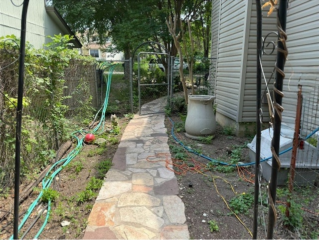 8306 Hanbridge Ln, Austin, TX 78736 - view of yard with a gate